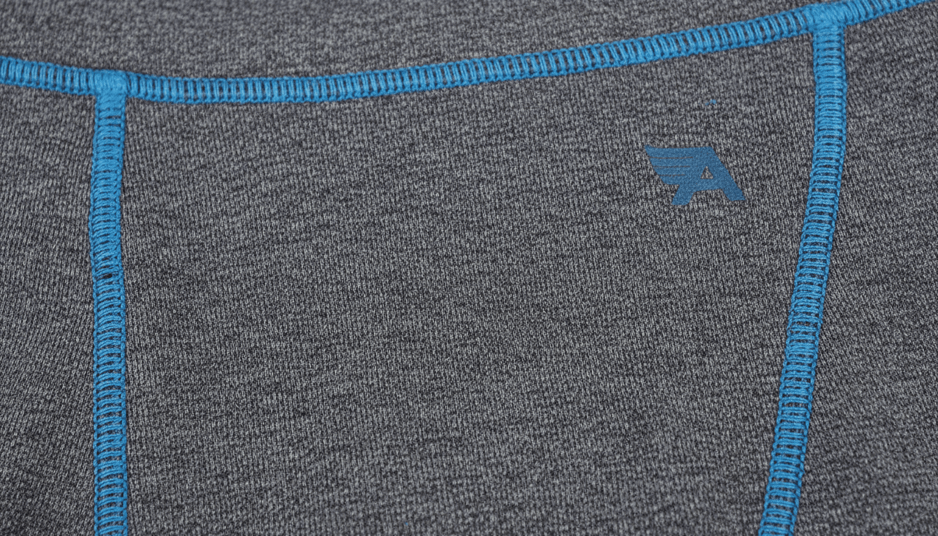 Close-up of fabric and stitching on a pair of performance leggings